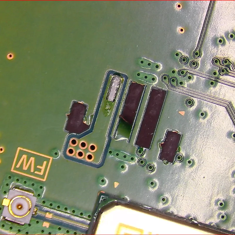 Wide view of PS5 motherboard showing torn fan connector location and surrounding components