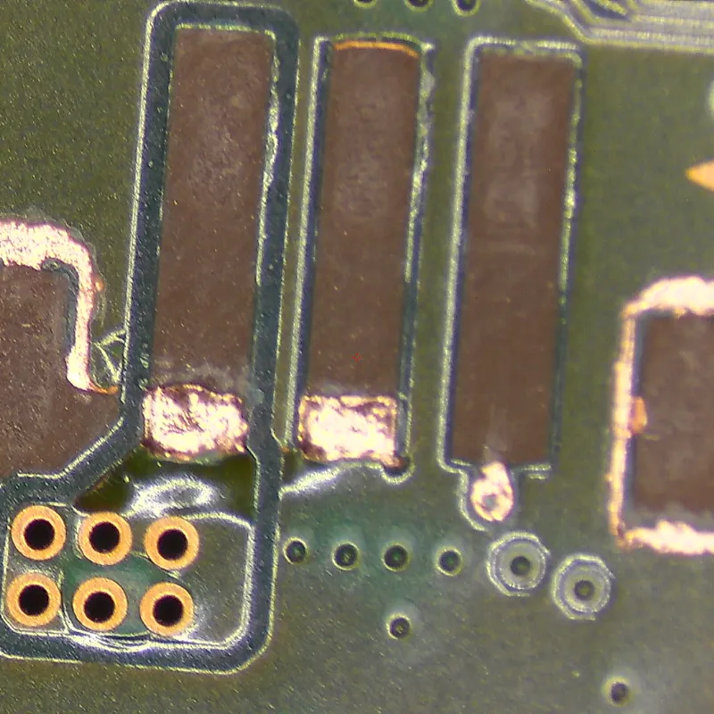 PS5 motherboard showing ripped solder pads where fan connector was forcibly removed