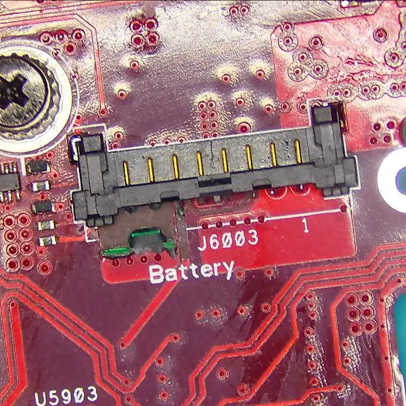 Replacement 8-pin battery connector installed on the ASUS ROG Ally X motherboard after trace reconstruction at Seki Gadgets